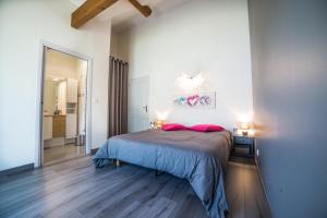 Postel nebo postele na pokoji v ubytování Gîte LaurieRaphael
