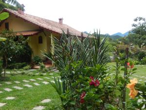 Um jardim em Pousada Ribeirao da Floresta