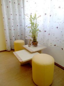 Posezení v ubytování Hotel Conforto Latino