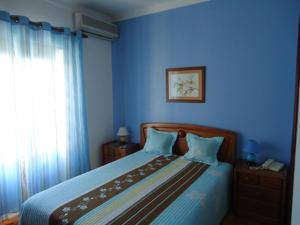 Cama o camas de una habitación en Hotel Conforto Latino