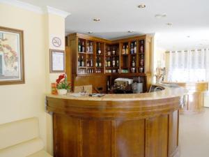 Lounge nebo bar v ubytování Hotel Conforto Latino
