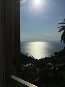 a view of the ocean from a building at B&B Villa Orchidea in Camogli