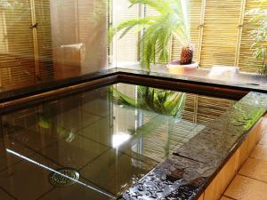 Bazén v ubytování Marumo Ryokan nebo v jeho okolí