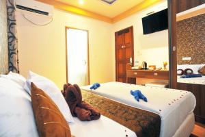 Letto o letti in una camera di Turquoise Residence by UI