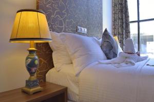 Letto o letti in una camera di Turquoise Residence by UI