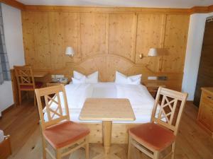 Postel nebo postele na pokoji v ubytování Hotel Kirchenwirt