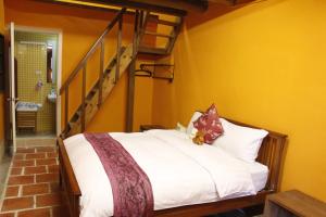 Letto o letti in una camera di PianoPiano B&B