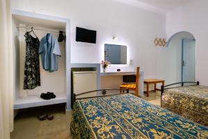 Krevet ili kreveti u jedinici u okviru objekta Akis Hotel