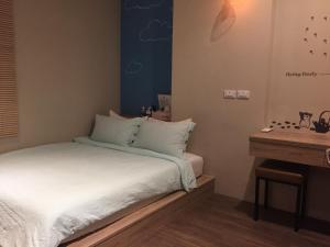 Voodi või voodid majutusasutuse Enjoy Homestay toas