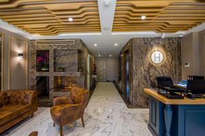 a lobby of a hotel with a reception desk at Homelike Hotel in Istanbul