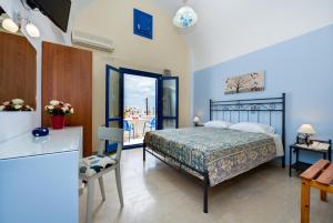 Krevet ili kreveti u jedinici u okviru objekta Akis Hotel