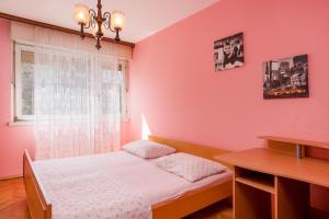 Posteľ alebo postele v izbe v ubytovaní Budget Split Apartment + 4 fotografie