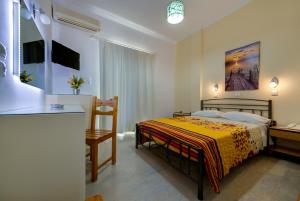 Krevet ili kreveti u jedinici u okviru objekta Akis Hotel