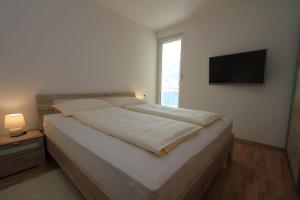 Posteľ alebo postele v izbe v ubytovaní Luxury Omiš Apartment