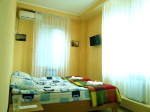 Ліжко або ліжка в номері Guest House at Kirova Street