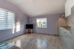 Kuchyň nebo kuchyňský kout v ubytování Apartman Leon & rent a quad
