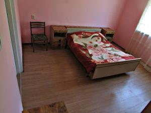 Postel nebo postele na pokoji v ubytování Joni Guest House