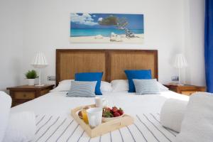 Postel nebo postele na pokoji v ubytování SingularStays Artes + 32 fotografií