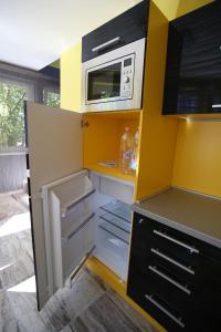 Kuchyň nebo kuchyňský kout v ubytování Centrum Lux Apartman