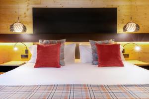 TV a/nebo společenská místnost v ubytování Park Piolets MountainHotel & Spa