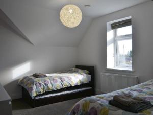 Postel nebo postele na pokoji v ubytování Ancrum House