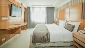 Кровать или кровати в номере Hotel Astoria Palace
