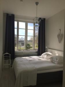 Postel nebo postele na pokoji v ubytování Wramsta B&B