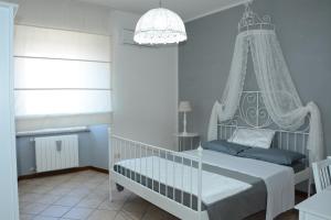 Postel nebo postele na pokoji v ubytování Maison Huguette