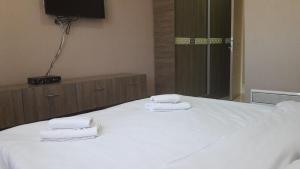 Postel nebo postele na pokoji v ubytování Hotel Ultra Star