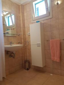 Koupelna v ubytování Apartment Leonarda