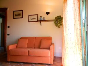 A seating area at Villa il Pino by VacaVilla