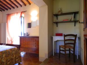 A bed or beds in a room at Villa il Pino by VacaVilla
