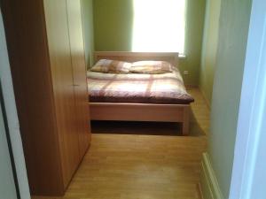 Postel nebo postele na pokoji v ubytování Jaani 2-1 Apartment