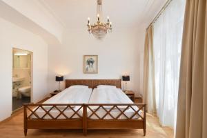 Postel nebo postele na pokoji v ubytování Hotel National Bern