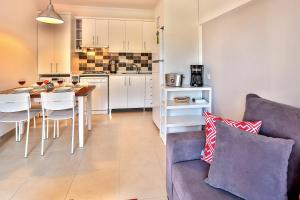 Kuchyň nebo kuchyňský kout v ubytování Kasinn Apart Hotel