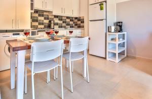Kuchyň nebo kuchyňský kout v ubytování Kasinn Apart Hotel