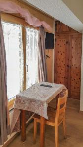 TV a/nebo společenská místnost v ubytování Hotel Restaurant Monte Leone