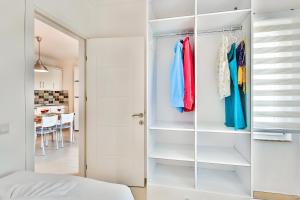 Postel nebo postele na pokoji v ubytování Kasinn Apart Hotel