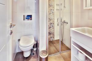 Koupelna v ubytování Kasinn Apart Hotel