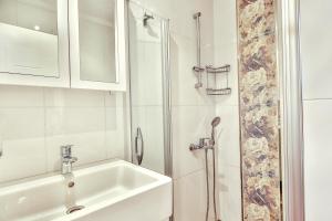Koupelna v ubytování Kasinn Apart Hotel