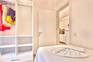 Postel nebo postele na pokoji v ubytování Kasinn Apart Hotel