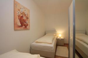 Posteľ alebo postele v izbe v ubytovaní Luxury Omiš Apartment