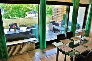Ein Sitzbereich in der Unterkunft Apartment am Römerkreis