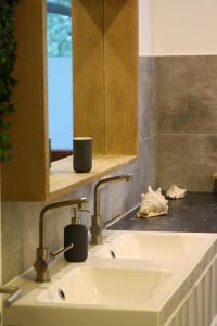 Ein Badezimmer in der Unterkunft Apartment am Römerkreis