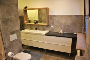 Ein Badezimmer in der Unterkunft Apartment am Römerkreis
