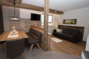 TV a/nebo společenská místnost v ubytování Inn-Apartments