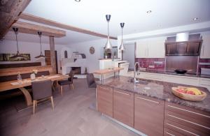 Kuchyň nebo kuchyňský kout v ubytování Inn-Apartments
