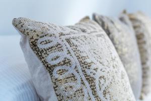 Postel nebo postele na pokoji v ubytování Blancos Rooms Hotel