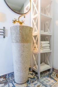 Postel nebo postele na pokoji v ubytování Blancos Rooms Hotel