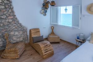 Postel nebo postele na pokoji v ubytování Blancos Rooms Hotel